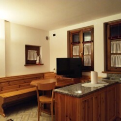 Val di Rabbi appartamento in baita soggiorno