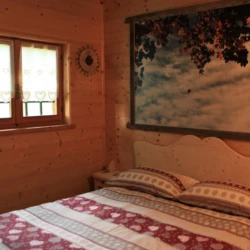 camera da letto nella baita Tana da lOrs
