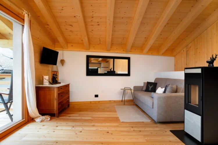soggiorno zona relax chalet in affitto Trentino